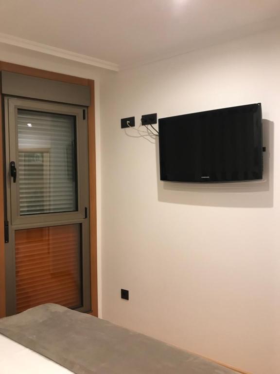 A television and/or entertainment centre at Apartamento La Buena Vida
