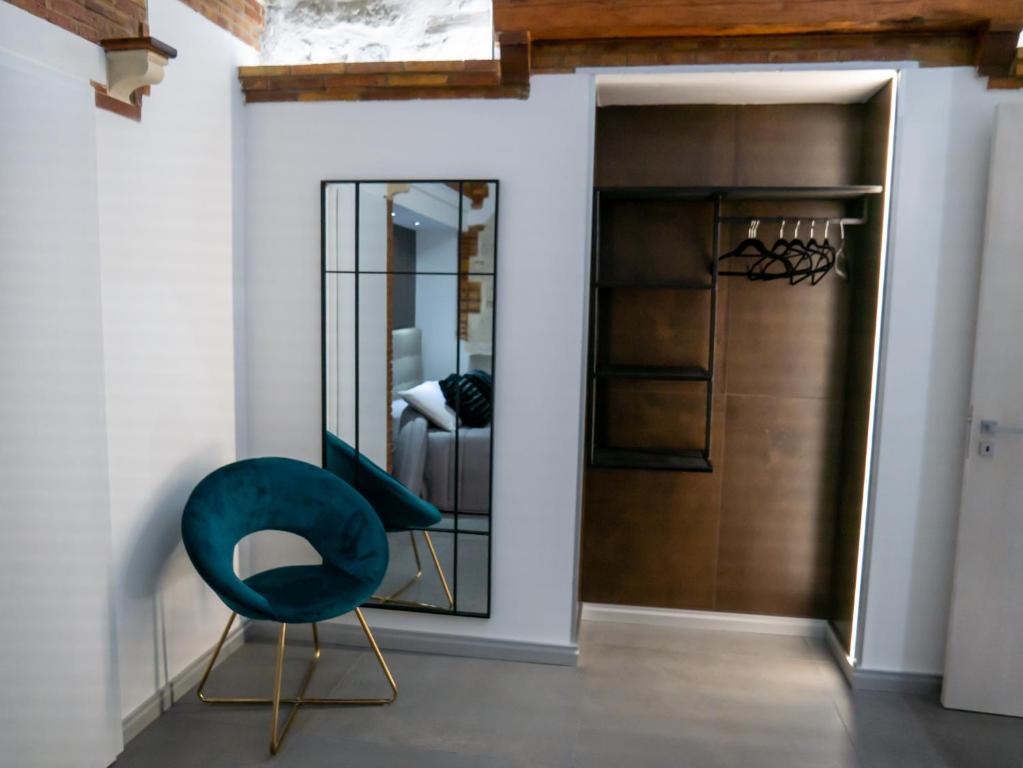 A seating area at VaKKia - Ortigia Holiday Home