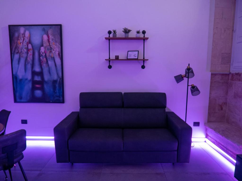 A seating area at VaKKia - Ortigia Holiday Home