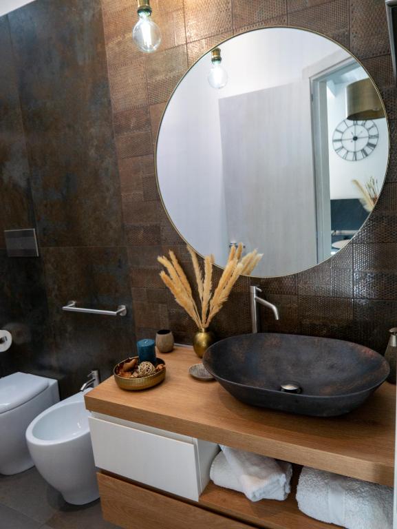 A bathroom at VaKKia - Ortigia Holiday Home