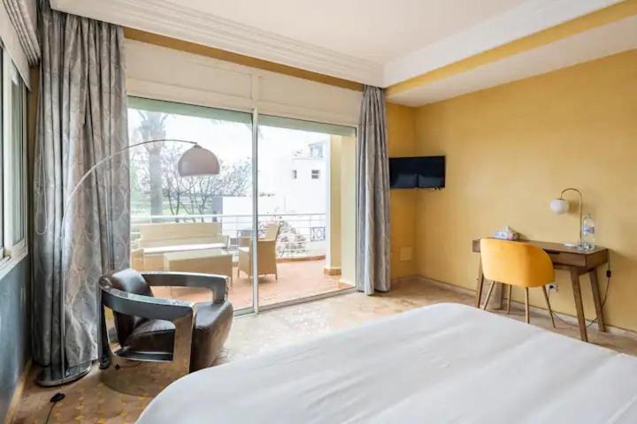 Postel nebo postele na pokoji v ubytování La villa des corsaires, vue panoramique sur Rabat