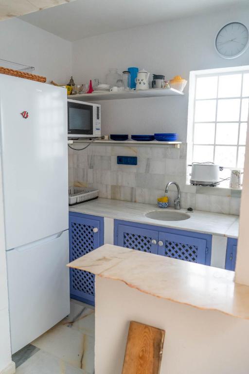 Kuchyňa alebo kuchynka v ubytovaní Casa de la Rosa