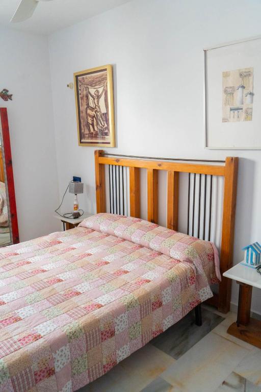 Posteľ alebo postele v izbe v ubytovaní Casa de la Rosa