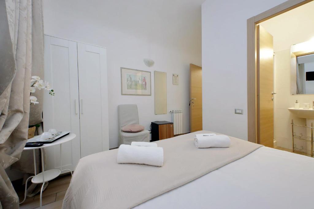Posteľ alebo postele v izbe v ubytovaní Dream City Rome