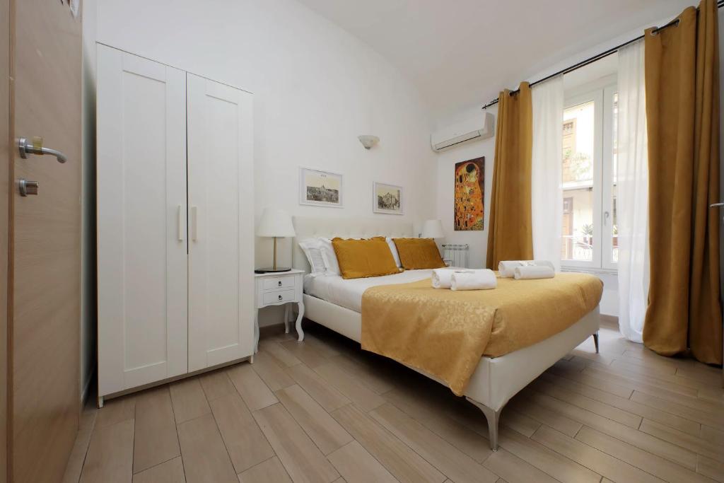 Posteľ alebo postele v izbe v ubytovaní Dream City Rome