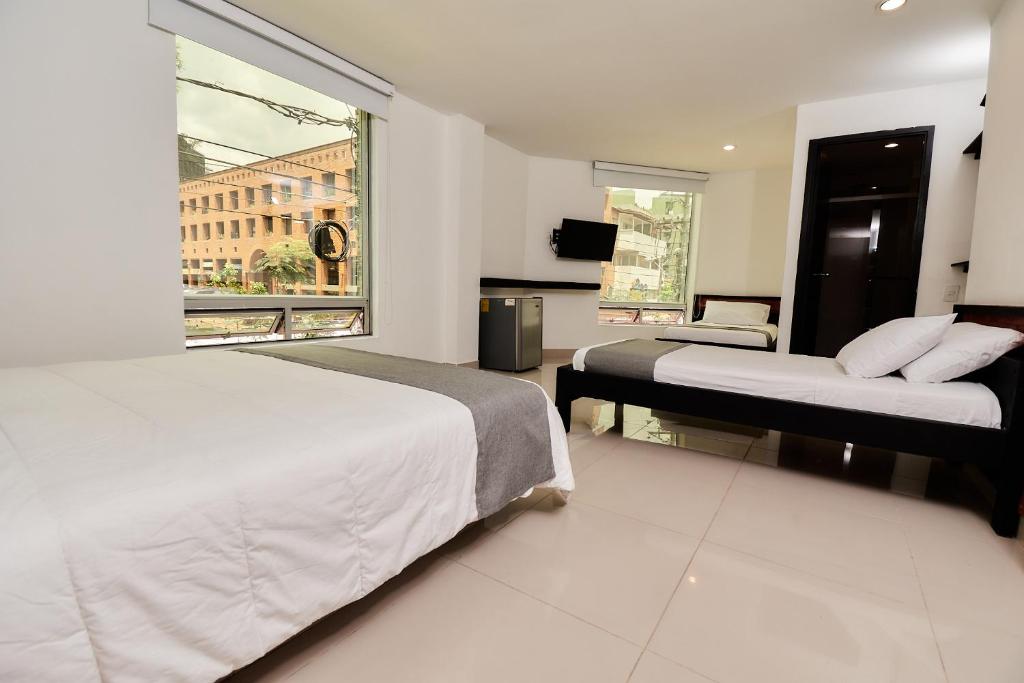 Postel nebo postele na pokoji v ubytování Tik by Bernalo Hotels