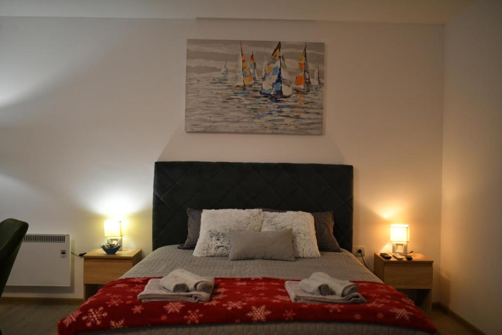 Postel nebo postele na pokoji v ubytování West in apartments