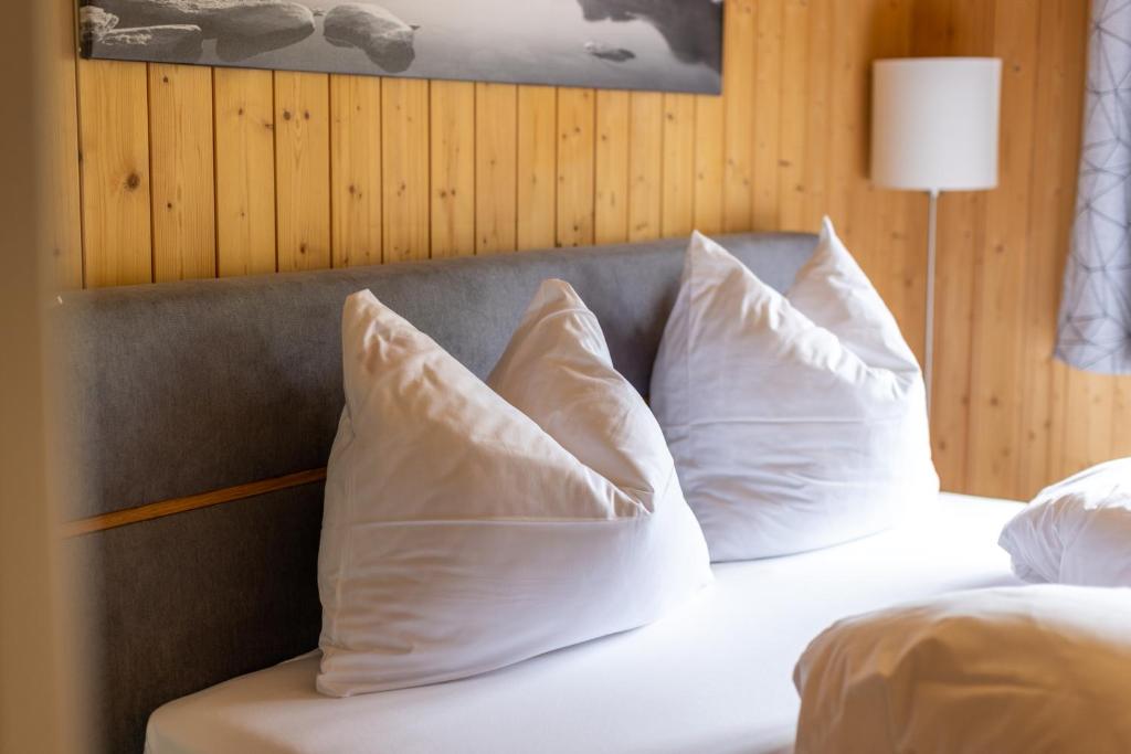 Postel nebo postele na pokoji v ubytování Apartmenthaus Matri by Pferd auf Wolke