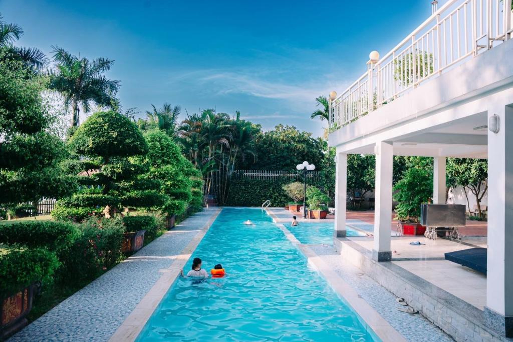 Bazén v ubytování Villa Hồ Đồngng Quýt - Venuestay nebo v jeho okolí