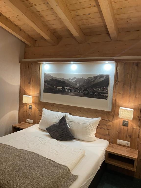 Postel nebo postele na pokoji v ubytování Gletscherchalet