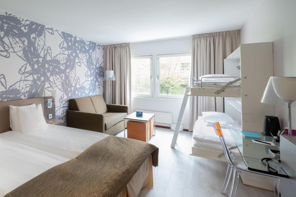 Postel nebo postele na pokoji v ubytování Quality Hotel Luleå