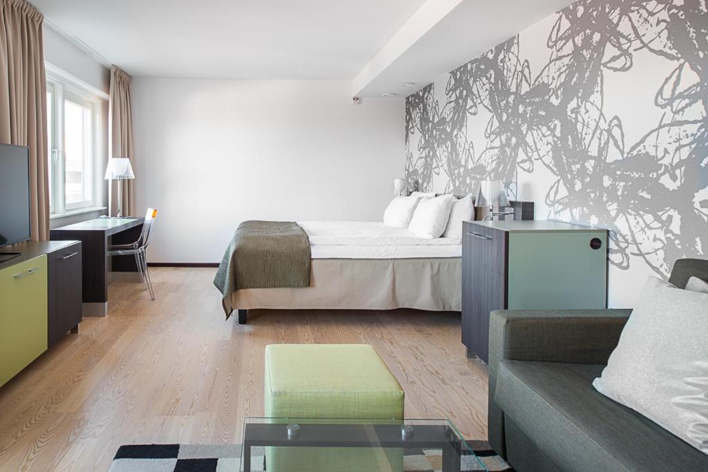 Postel nebo postele na pokoji v ubytování Quality Hotel Luleå