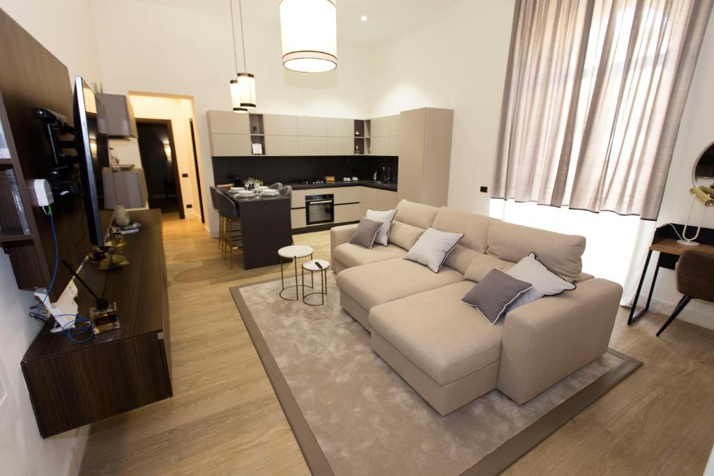 Televízia a/alebo spoločenská miestnosť v ubytovaní N A P Experience Apartments