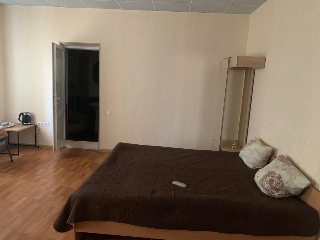 Postel nebo postele na pokoji v ubytování Apartment on Mira avenue