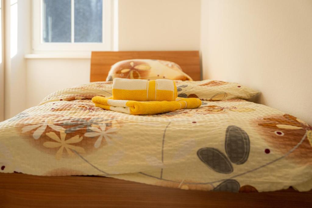 Postel nebo postele na pokoji v ubytování Relax House Soča