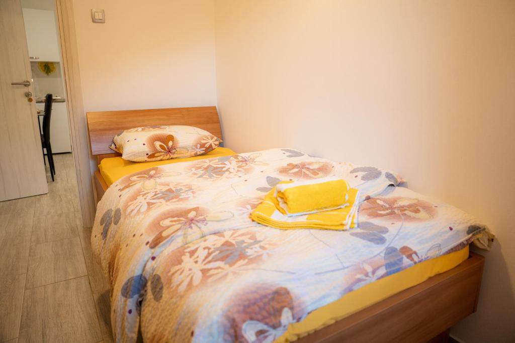 Postel nebo postele na pokoji v ubytování Relax House Soča