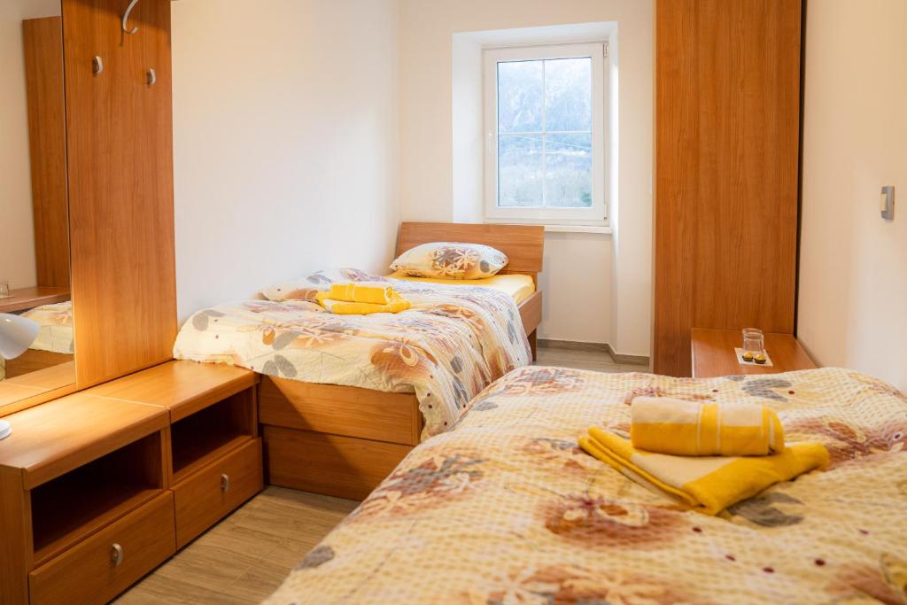 Postel nebo postele na pokoji v ubytování Relax House Soča