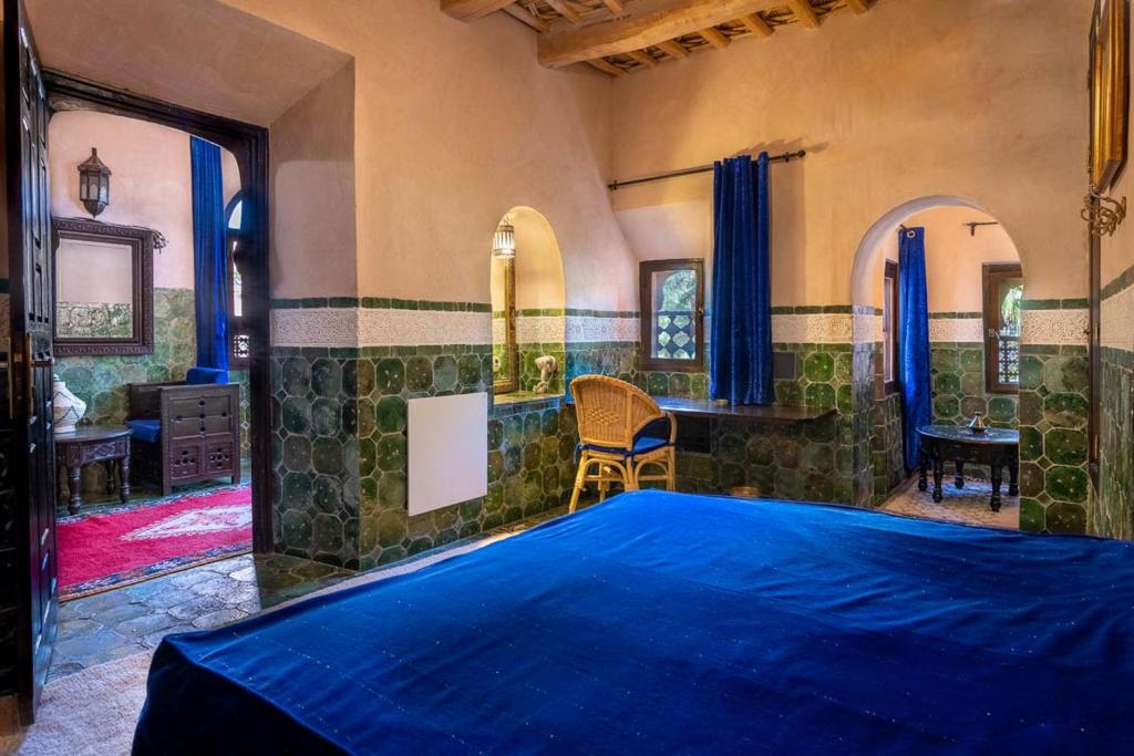 Postel nebo postele na pokoji v ubytování Hôtel Riad Dar Daïf
