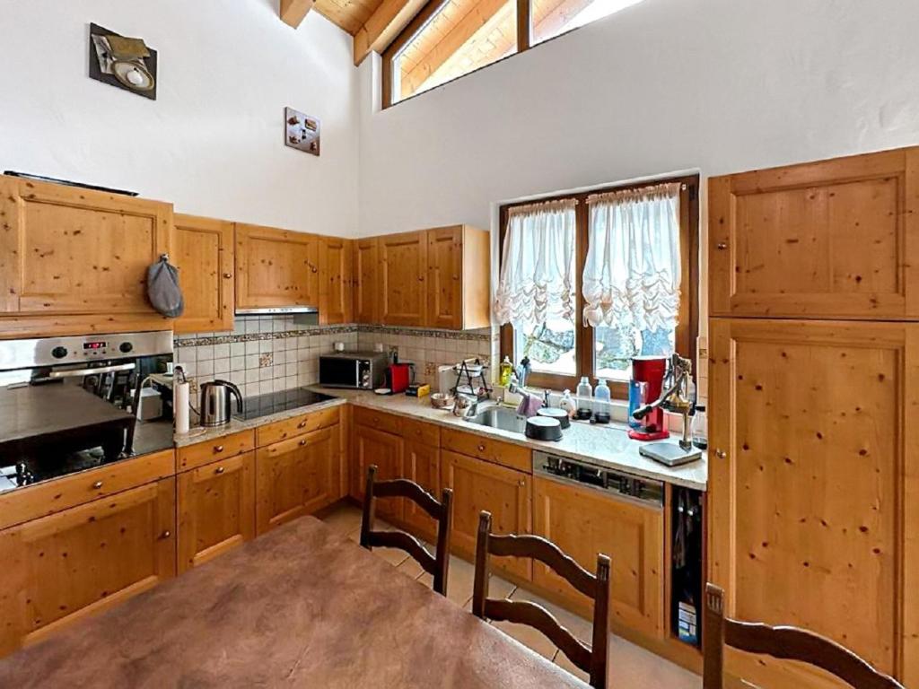 Kuchyň nebo kuchyňský kout v ubytování Chalet Etoile Polaire