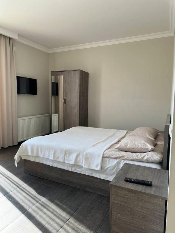 Postel nebo postele na pokoji v ubytování Villa Bakuriani