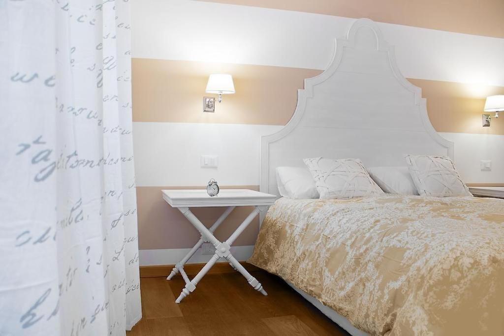 Postel nebo postele na pokoji v ubytování Residenza Cantore