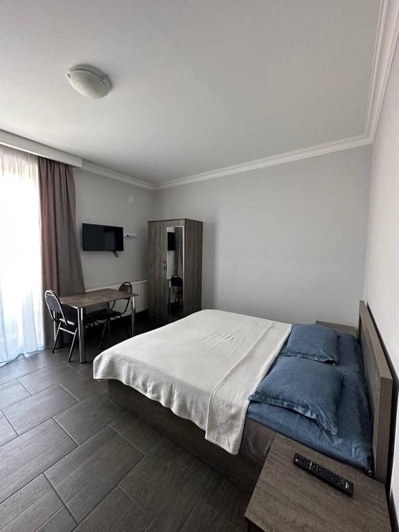 Postel nebo postele na pokoji v ubytování Villa Bakuriani
