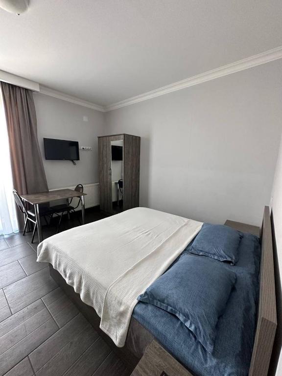 Postel nebo postele na pokoji v ubytování Villa Bakuriani