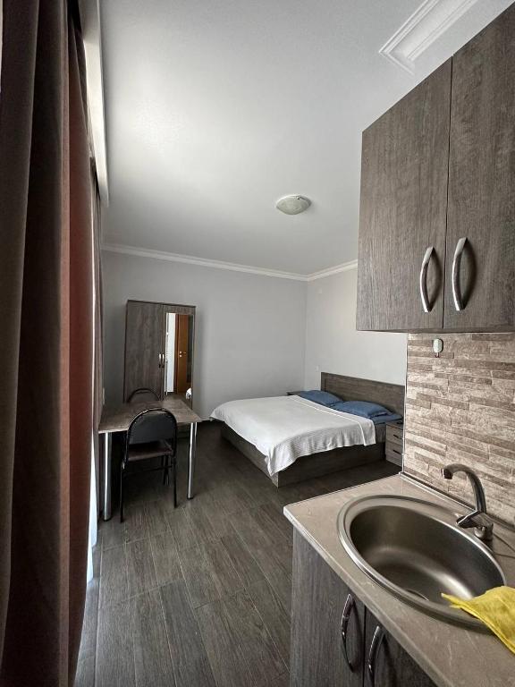 Postel nebo postele na pokoji v ubytování Villa Bakuriani