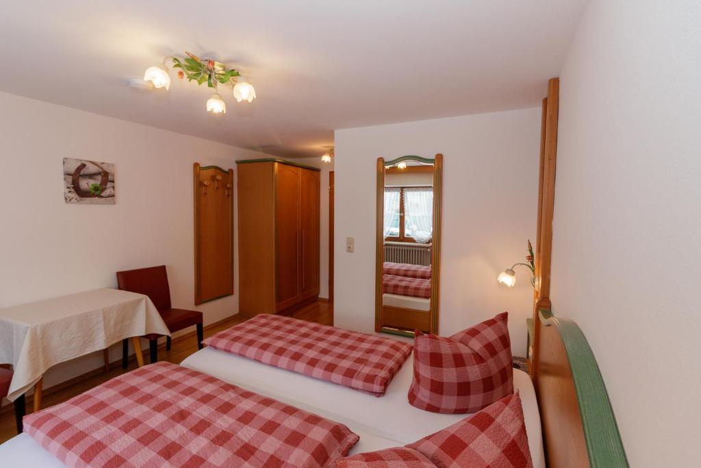 Postel nebo postele na pokoji v ubytování Hotel Binderhäusl
