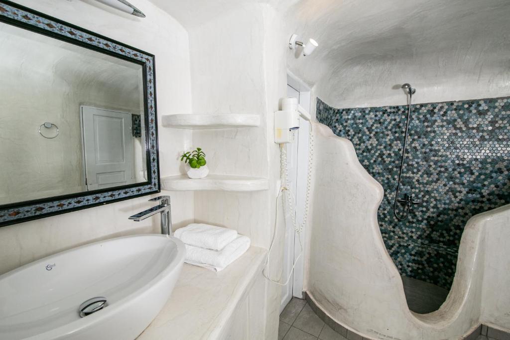 Koupelna v ubytování Vogue Suites