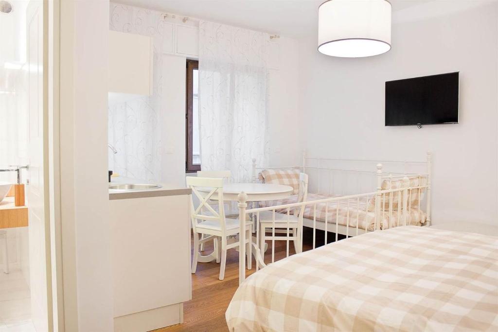 TV a/nebo společenská místnost v ubytování Residenza Cantore