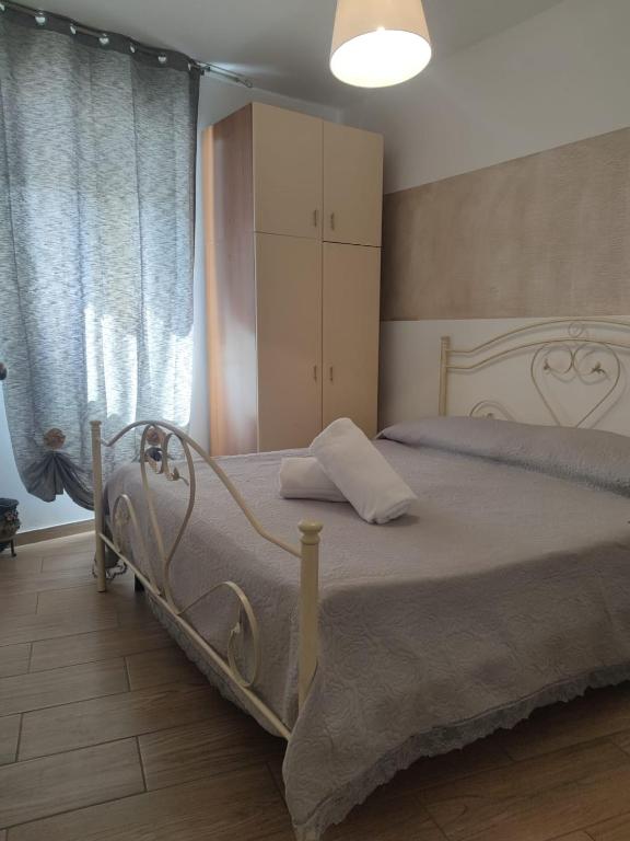 Postel nebo postele na pokoji v ubytování B&B Pastello