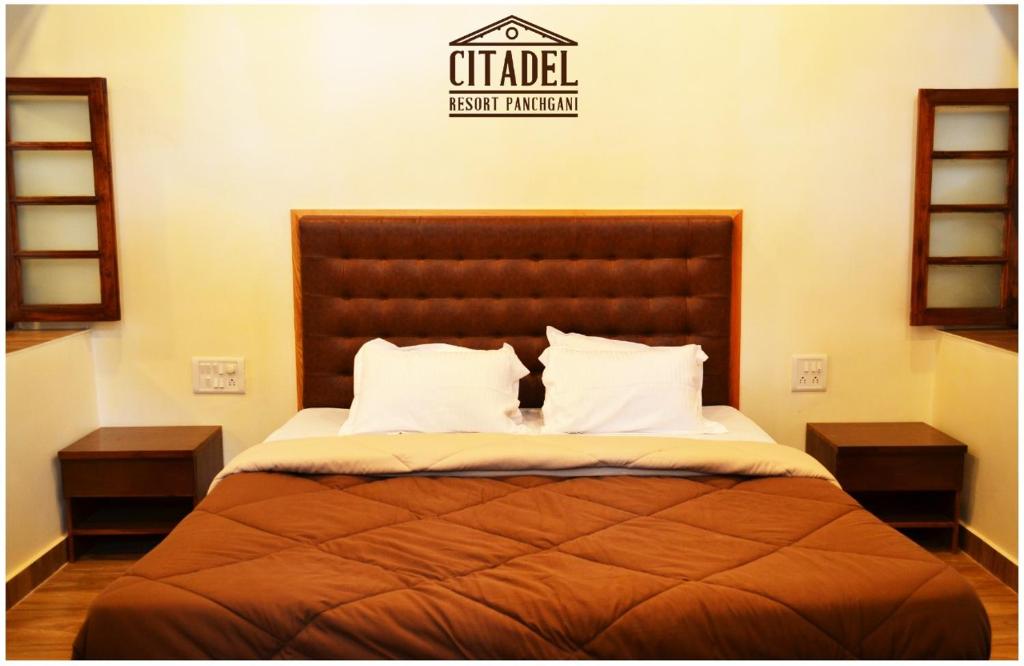 Postel nebo postele na pokoji v ubytování Citadel Resort