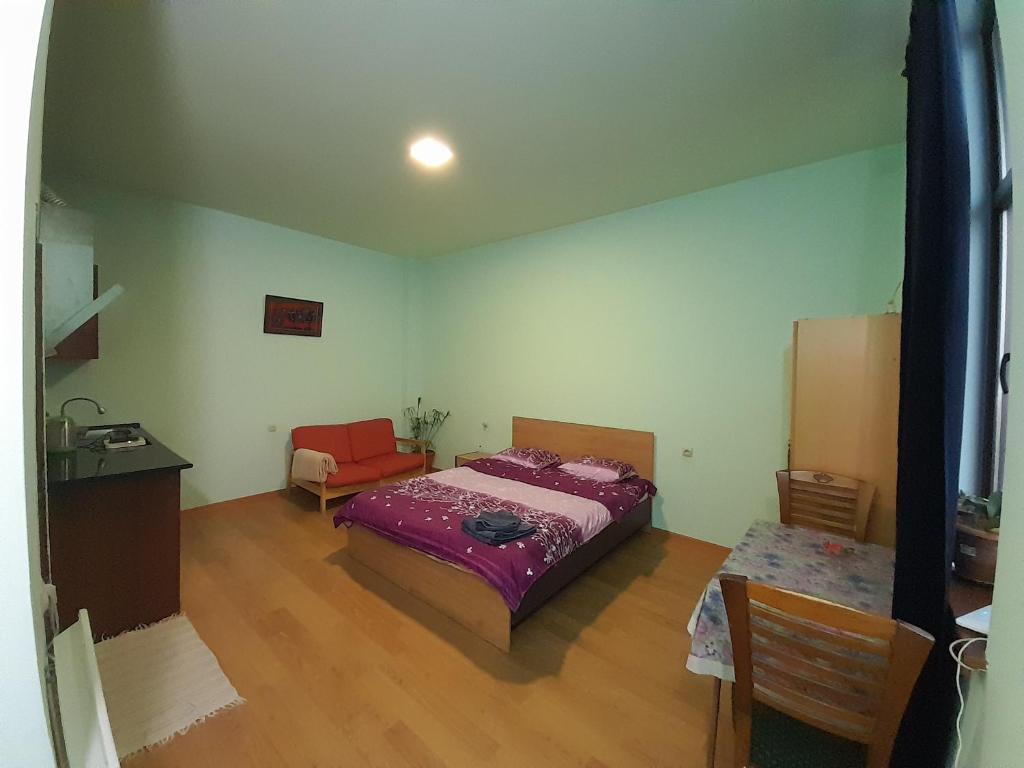 Postel nebo postele na pokoji v ubytování Art Guest House in KASKAD
