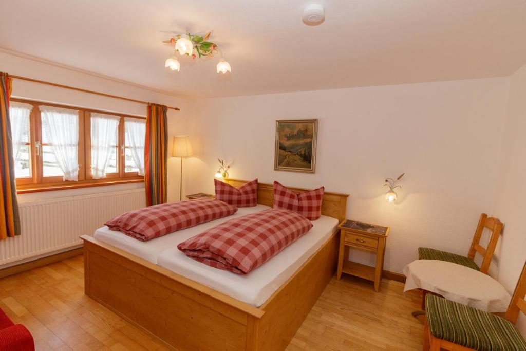 Postel nebo postele na pokoji v ubytování Hotel Binderhäusl
