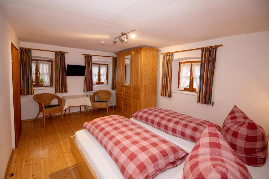 Postel nebo postele na pokoji v ubytování Hotel Binderhäusl