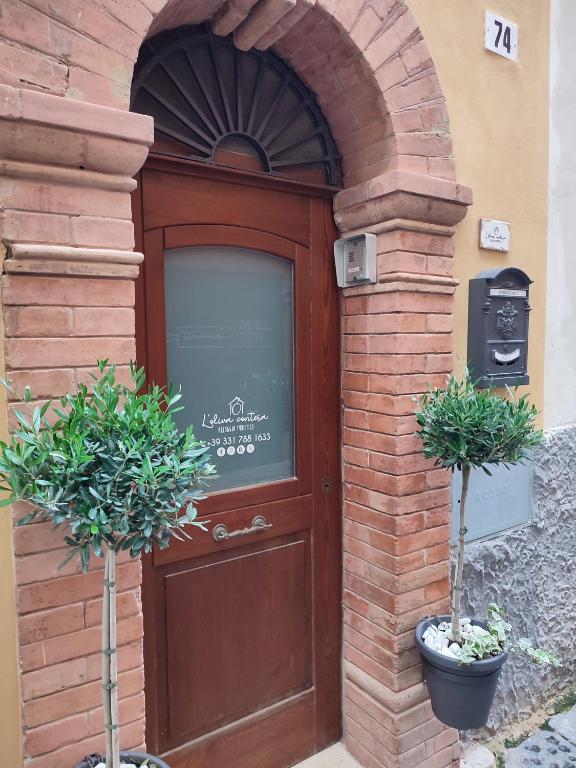 The facade or entrance of L'OLIVA CONTESA - la BLU