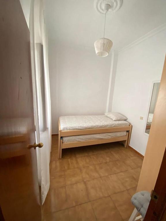 Posteľ alebo postele v izbe v ubytovaní Parras Apartamento