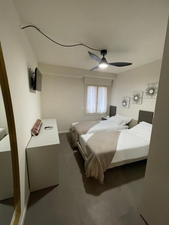 Postel nebo postele na pokoji v ubytování Lucia Holiday Apartments