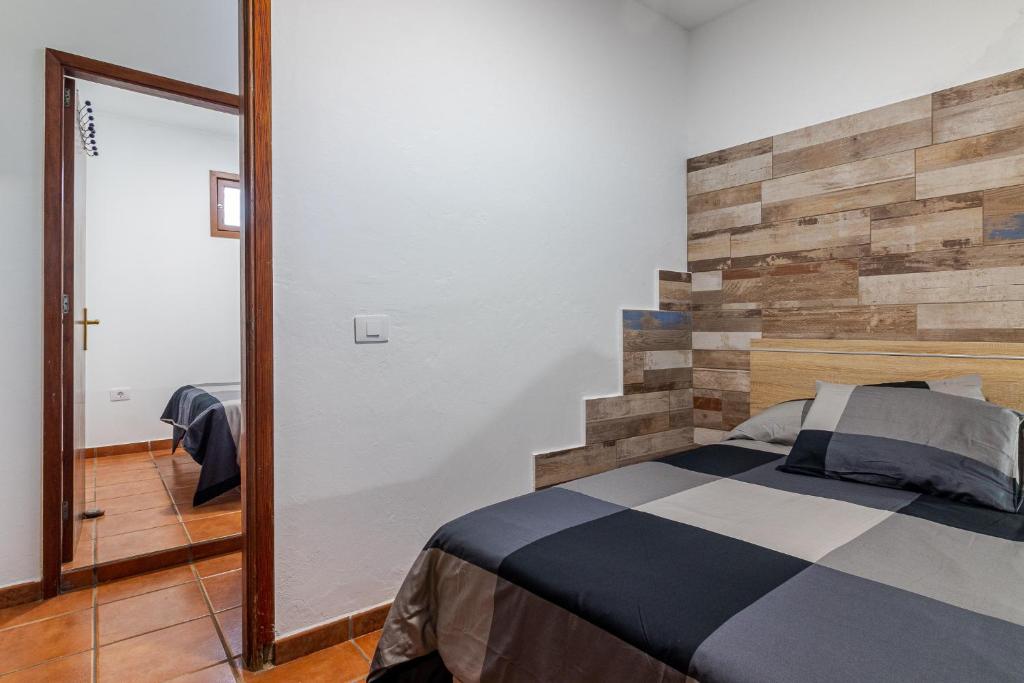 Posteľ alebo postele v izbe v ubytovaní Flatguest Faro de Sardina - 3 Bed - Coast - WIFI