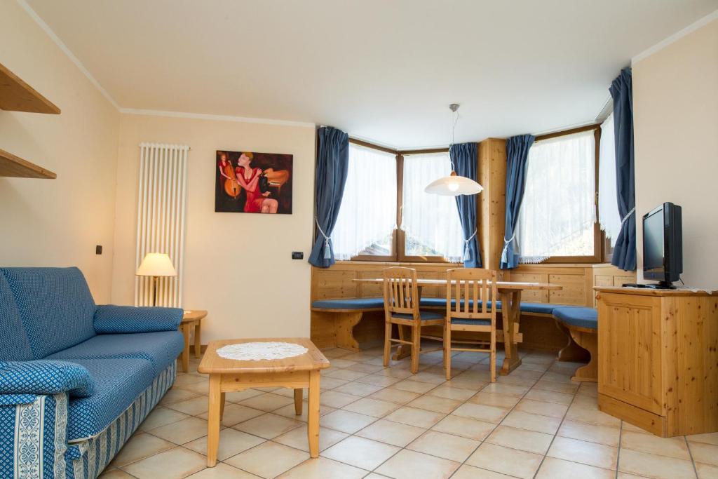 Televízia a/alebo spoločenská miestnosť v ubytovaní Hotel Al Prato