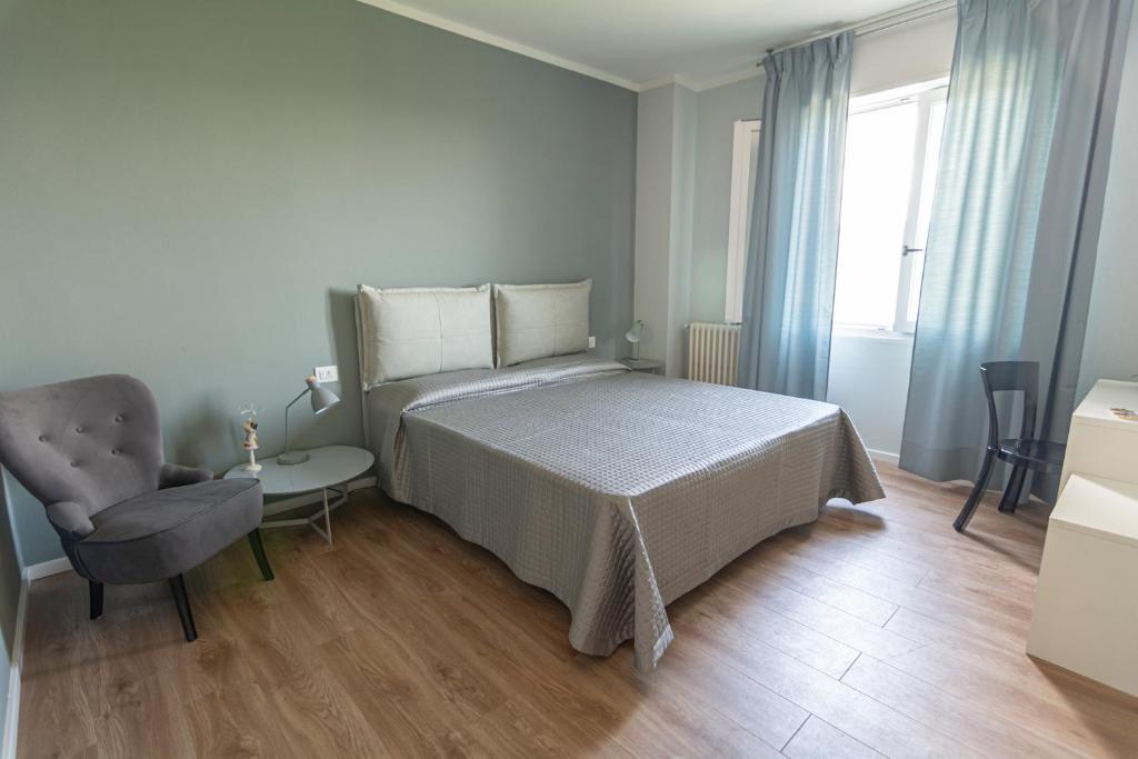 Postel nebo postele na pokoji v ubytování LE CAMERE DI MARIO