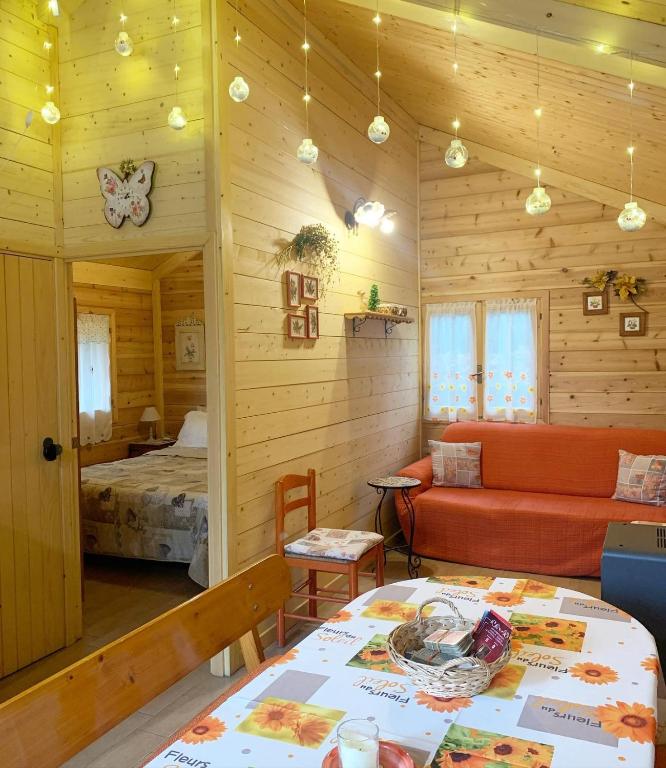 A bed or beds in a room at CHALET ETNA MILO