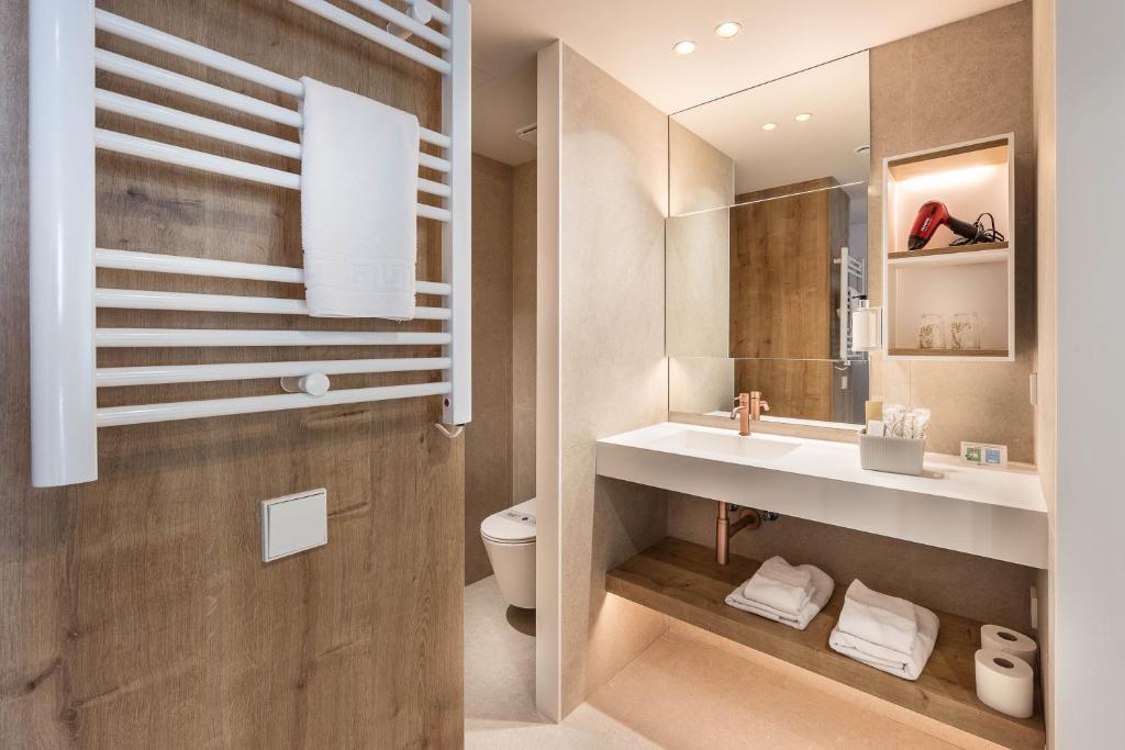 Koupelna v ubytování Hotel Montecarlo Spa & Wellness