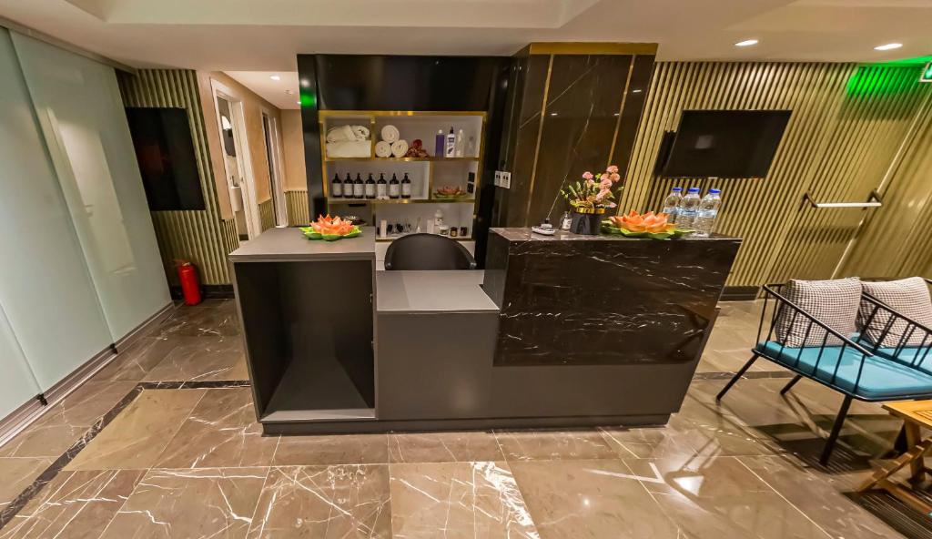 Kuchyň nebo kuchyňský kout v ubytování Costera Hotel