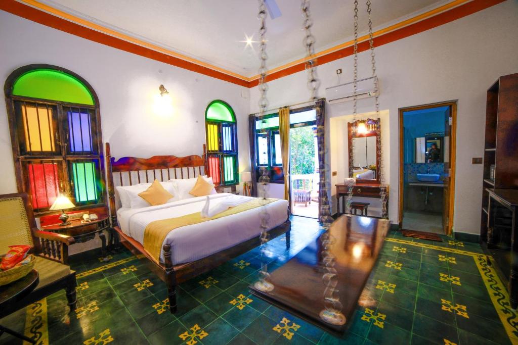 Postel nebo postele na pokoji v ubytování WOW Bison Woods Organic Veg Resort - Yercaud