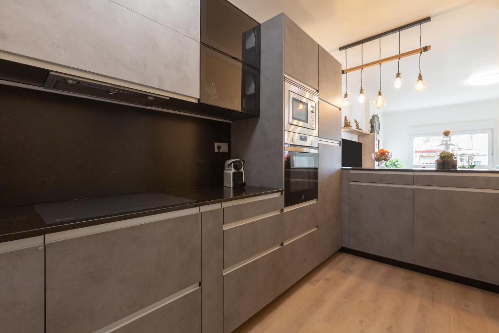 A kitchen or kitchenette at Palma de Mallorca 12