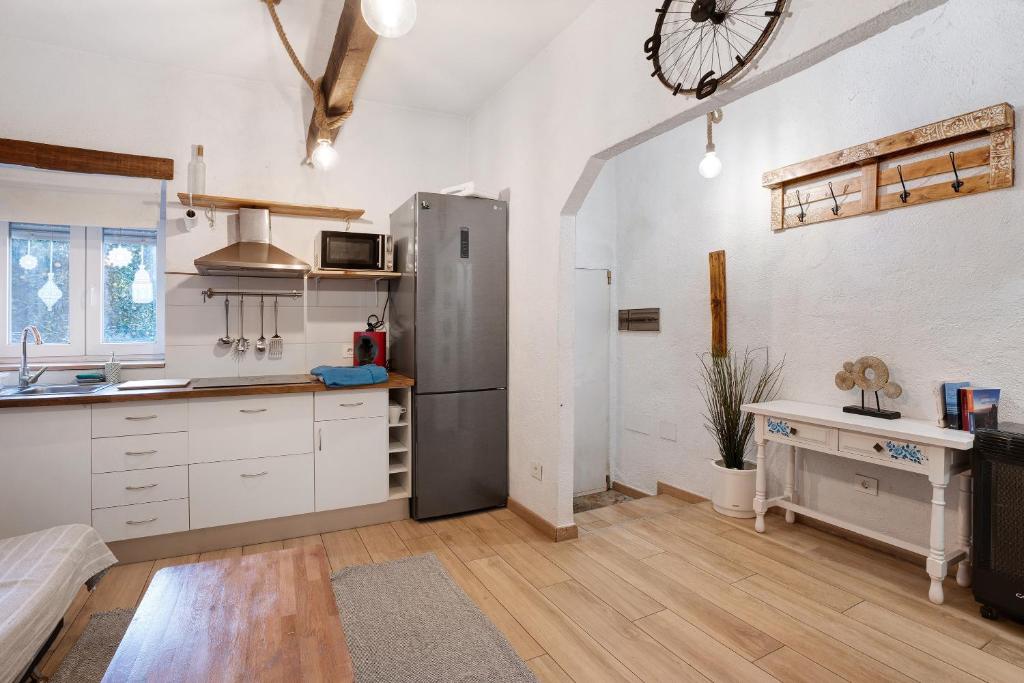 Kuchyň nebo kuchyňský kout v ubytování Casita Rural La Piñera