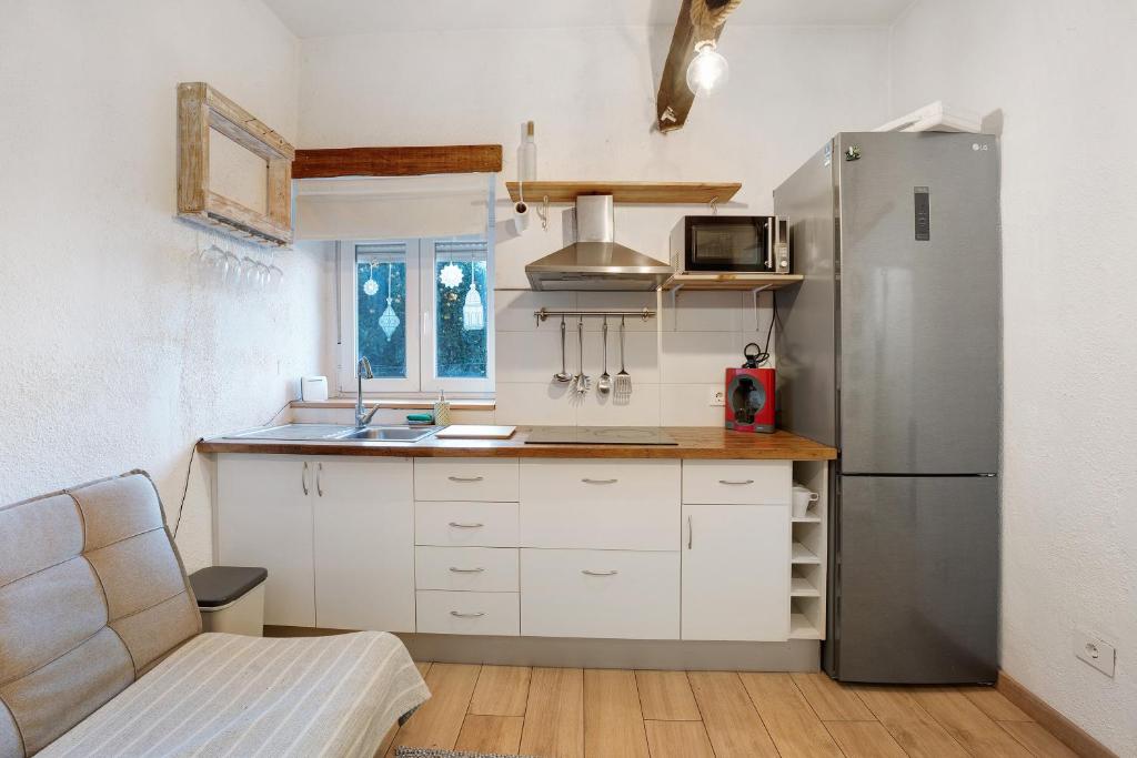 Kuchyň nebo kuchyňský kout v ubytování Casita Rural La Piñera
