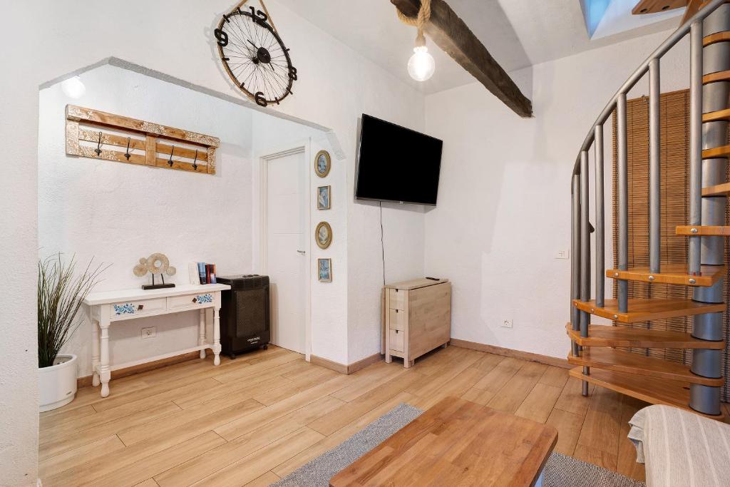 TV a/nebo společenská místnost v ubytování Casita Rural La Piñera